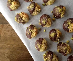 Pistachio Macaroons Dipped in Dark Chocolate